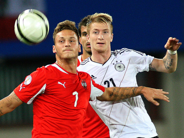 Marko Arnautovic (li., im Duell mit Marco Reus) vergab Österreichs beste Ausgleichsmöglichkeit.