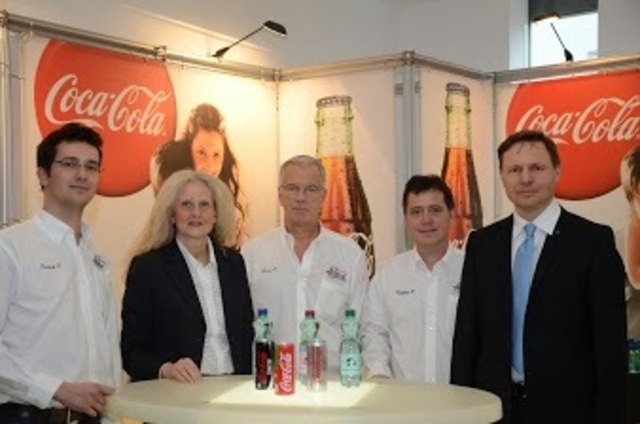 Aussteller Coca Cola mit Ingrid Puschautz-Meidl (c) IV