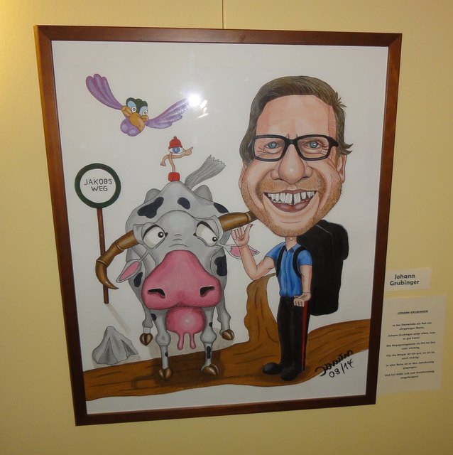 das große Ortsplatzwunder ist in Thalgau durch den gelben Asphalt bis jetzt noch nicht eingetreten, die Lernphase dauert halt noch an...Aus der Karrikaturenausstellung von Axel Kraus im Thalgauer Gemeindeamt.