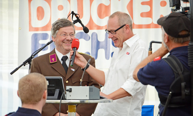 Stadtpfarrer Stefan Kollen und Moderator Thomas Schwazmann