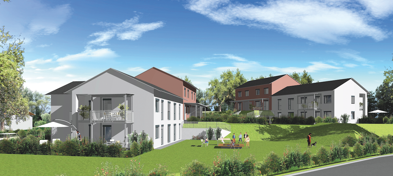 Die Grafik zeigt das fertige ÖWG-Wohnbau-Projekt mit Kinderspielplatz und großer Grünfläche, das noch im Sommer fertig werden soll.