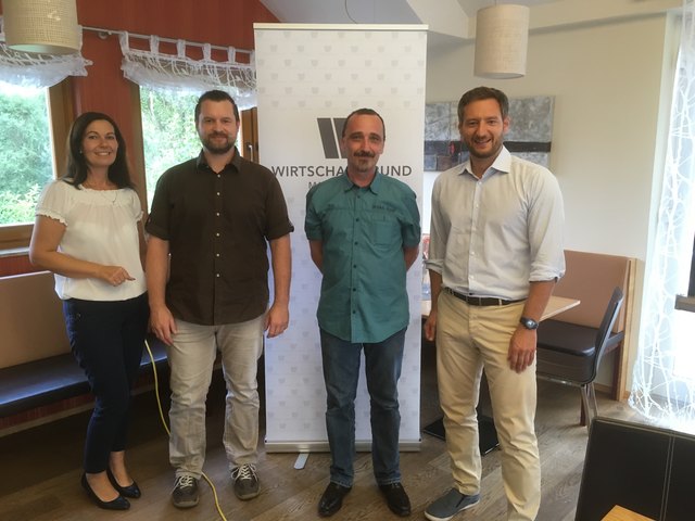 Melanie Eckhardt und Michael Ulrich mit den beiden Referenten Michael Pojer und Robert Smolinka