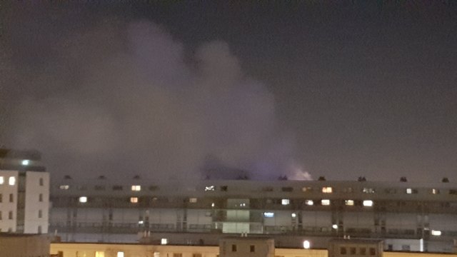 Dunkle Rauchwolken über Liesing