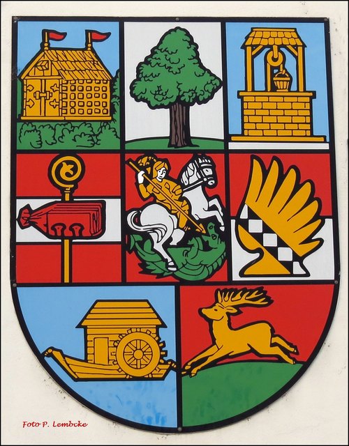 Hier sind die 8 Wappen der Bezirksteile von Donaustadt. Links oben Stadlau, danach Aspern und Süßenbrunn.In der Mitte Breitenlee, Kagran und Essling. Unten Kaisermühlen und Hirschstetten.