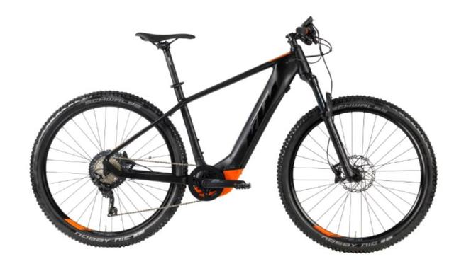 E-Mountainbike von KTM: kraftvoller Bosch Performance CX Gen4 Antrieb & Shimano 4-Kolben-Scheibenbremsen.