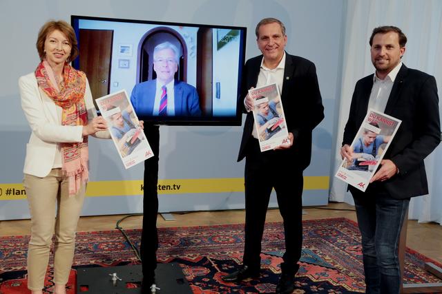 Peter Kaiser (per Video zugeschaltet) mit Gaby Schaunig, Andreas Görgei und Christoph Appé (rechts)