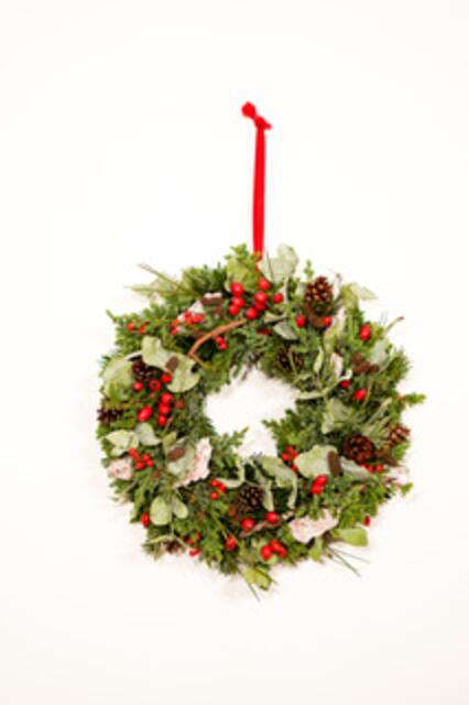 Auch Weihnachtskränze gibt es bei Blumen Wien Mitte.