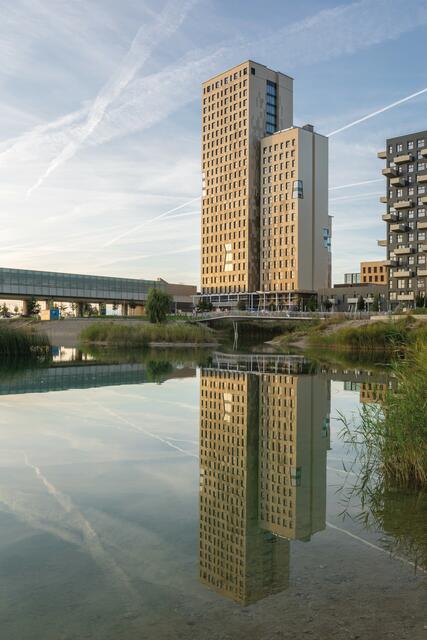 Das Holzhochhaus in der Seestadt Aspern (Wien) dient als Vorbild.