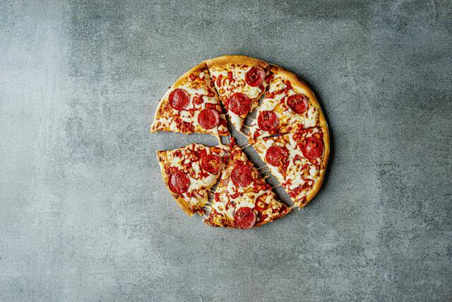Die erste Filiale wurde 1986 in Linz eröffnet, danach positionierte sich „Pizzamann“ als Franchise-System am Markt. (Symbolfoto) | Foto: Sylwia Pietruszka/Unsplash