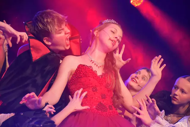 Students performing a scene from 'Broadway to Disney'