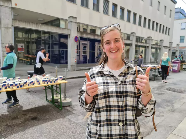 Helga Kaswurm steht am Streckenrand der Challenge St. Pölten, bereit einen Bekannten lautstark anzufeuern.