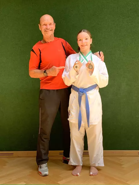 Trainer Ferdinand Hörmann mit Julia Dullnig | Foto: Karate Union Köflach