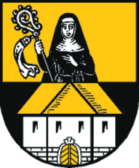 Das Wappen der Gemeinde ist zweigeteilt. Die Grundfarben sind Gold und Schwarz. | Foto: RMA Archiv