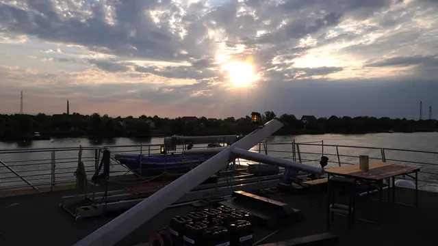 20.06.2025 die aufgehende Sonne im Hintergrund die Ortschaft St. Georg