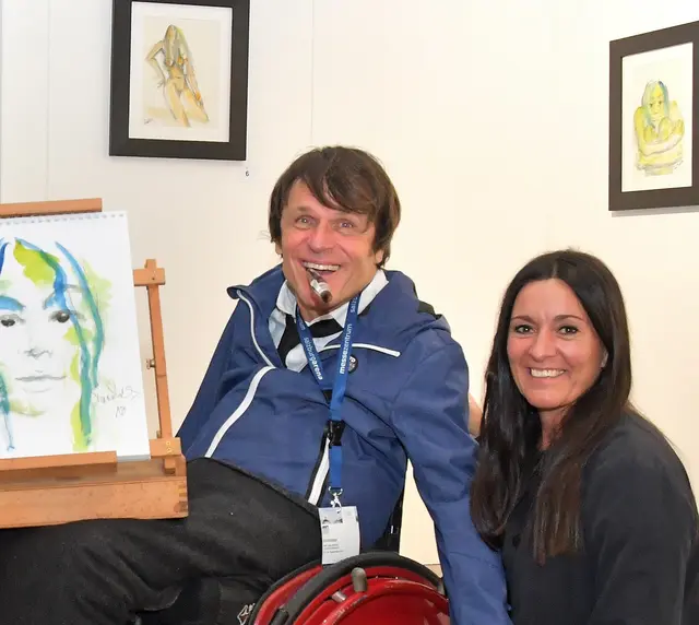 Mundmaler Paulus Ploier mit seiner Frau Monika anlässlich der Internationalen ART Salzburg im Jahre 2019. | Foto: Rudi Gigler