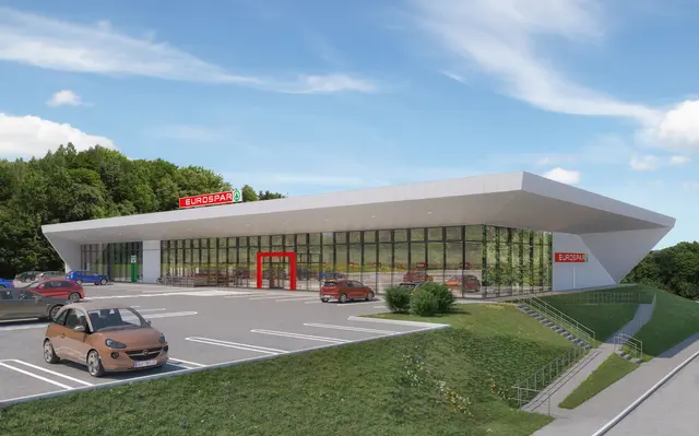 Der neue Güssinger Eurospar ist fast doppelt so groß wie der bisherige nebenan gelegene Spar-Markt. Dieser soll später Parkplätzen weichen.  | Foto: AVISU