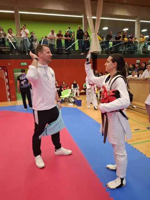 Coach Christian Lenzi und Elena Huber