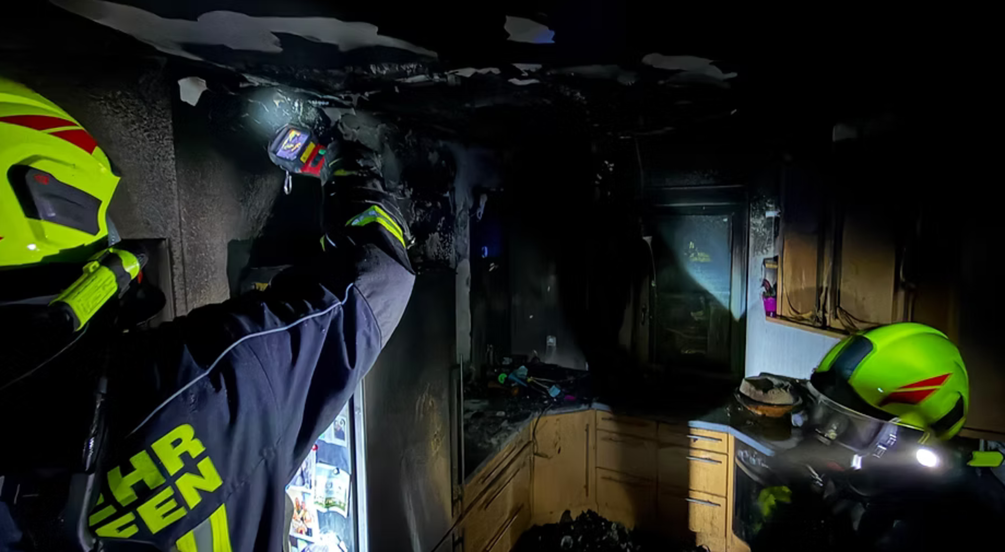 Firefighters in action: His home was on fire, but the firefighter was ...